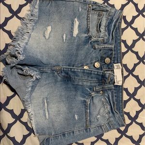 Tillys RSQ lighter wash frayed denim shorts Size 25